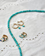 EF Collection Reversible Diamond & Turquoise Mini Huggie Earrings at Romi Boutique