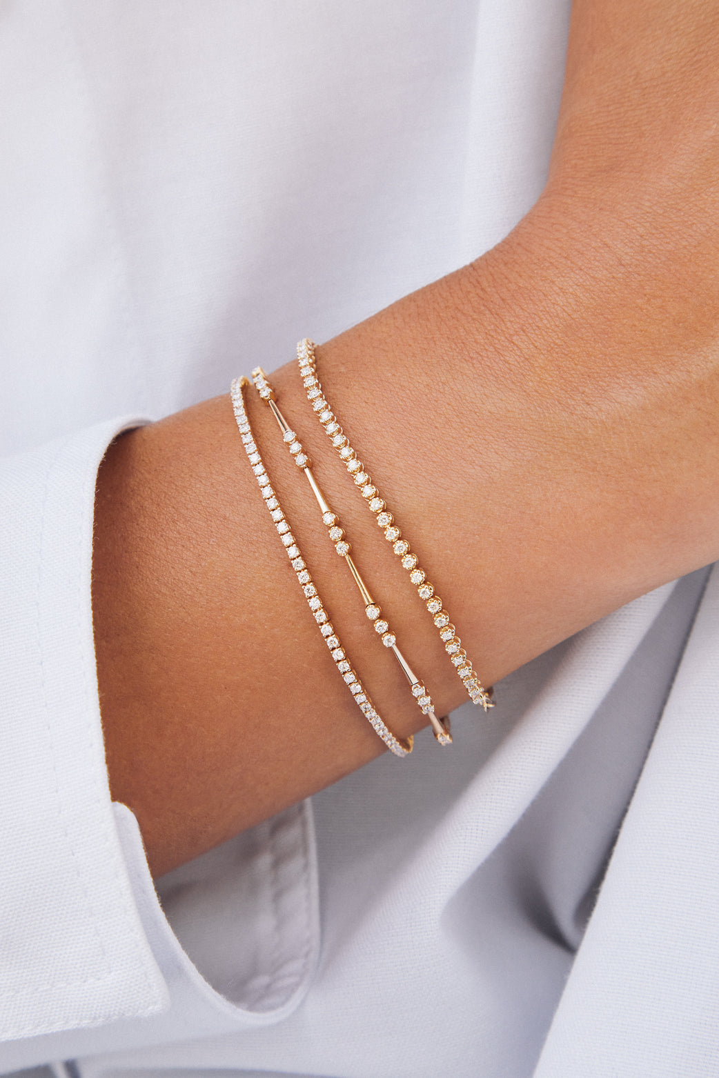 CROWN SET DIAMOND ETERNITY BRACELET IN 14K YELLOW GOLD