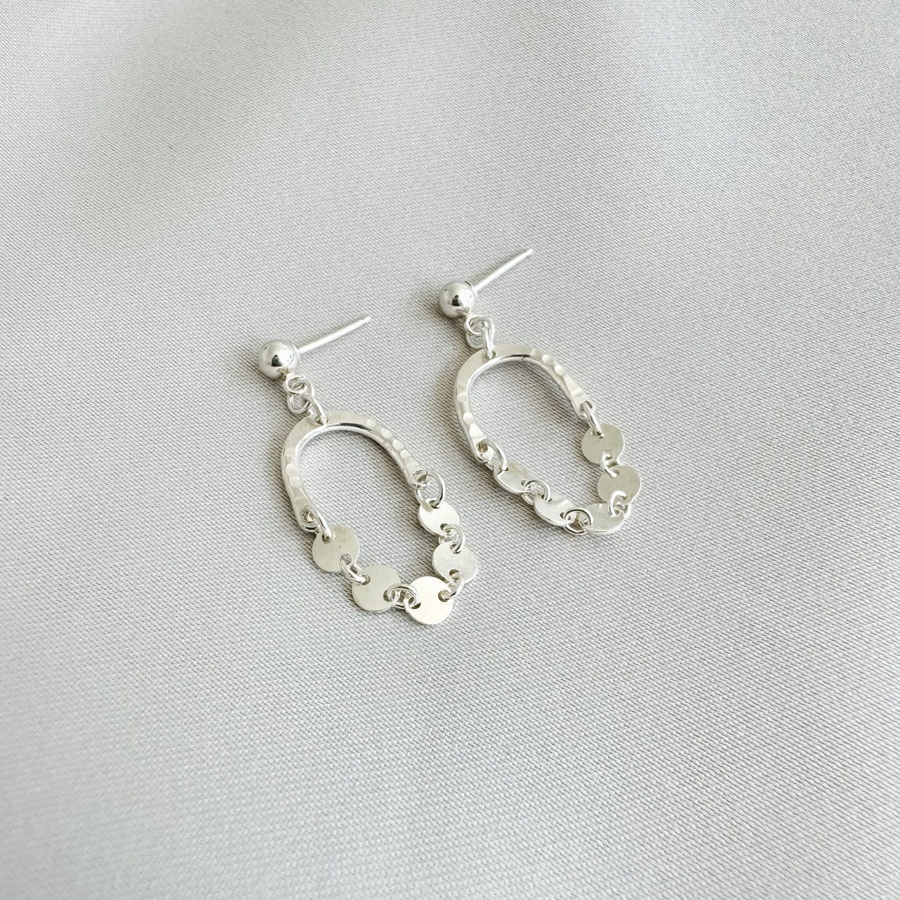 Maya Bauman MINI BELL EARRINGS IN SILVER at Romi Boutique