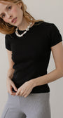DONNI. The Pointelle Baby Tee at Romi Boutique