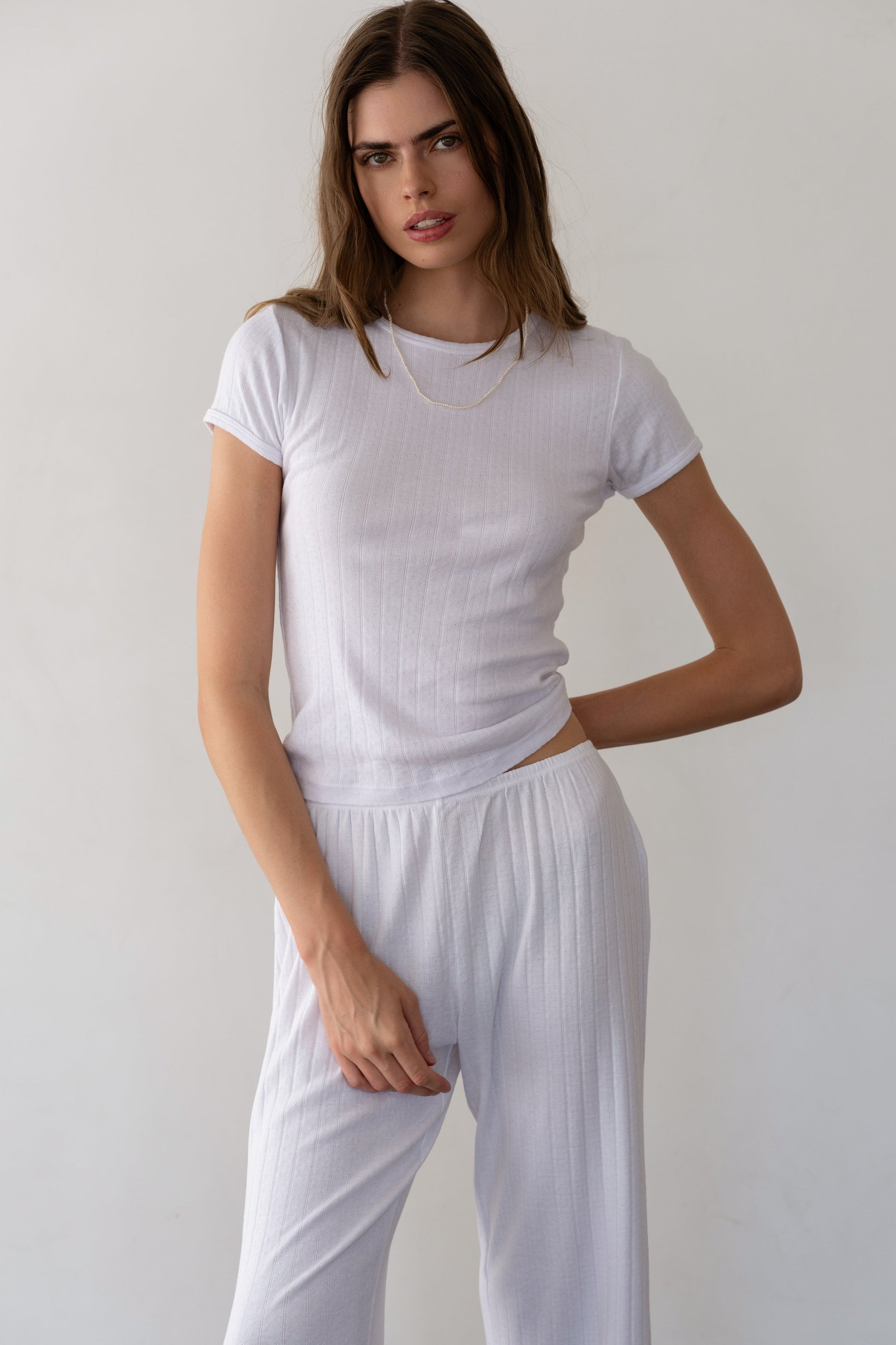 DONNI. THE POINTELLE BABY TEE at Romi Boutique
