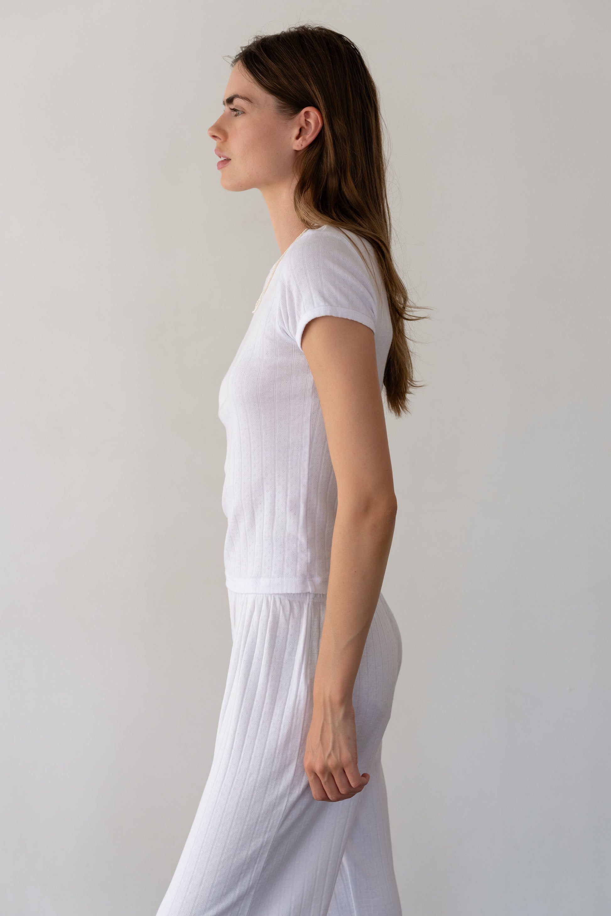 DONNI. THE POINTELLE BABY TEE at Romi Boutique