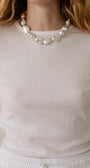 DONNI. THE POINTELLE BABY TEE at Romi Boutique