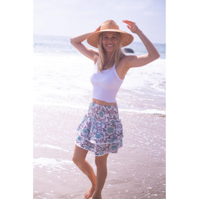 PLEATED SMOCKED MINI SKIRT IN LIGHT TURQUOISE PURPLE FLORAL