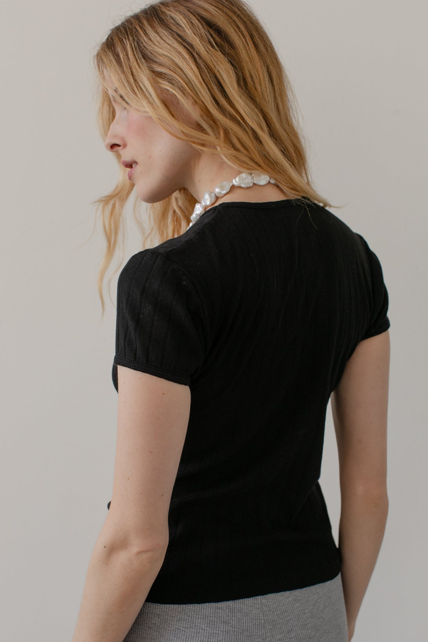 THE POINTELLE BABY TEE IN JET