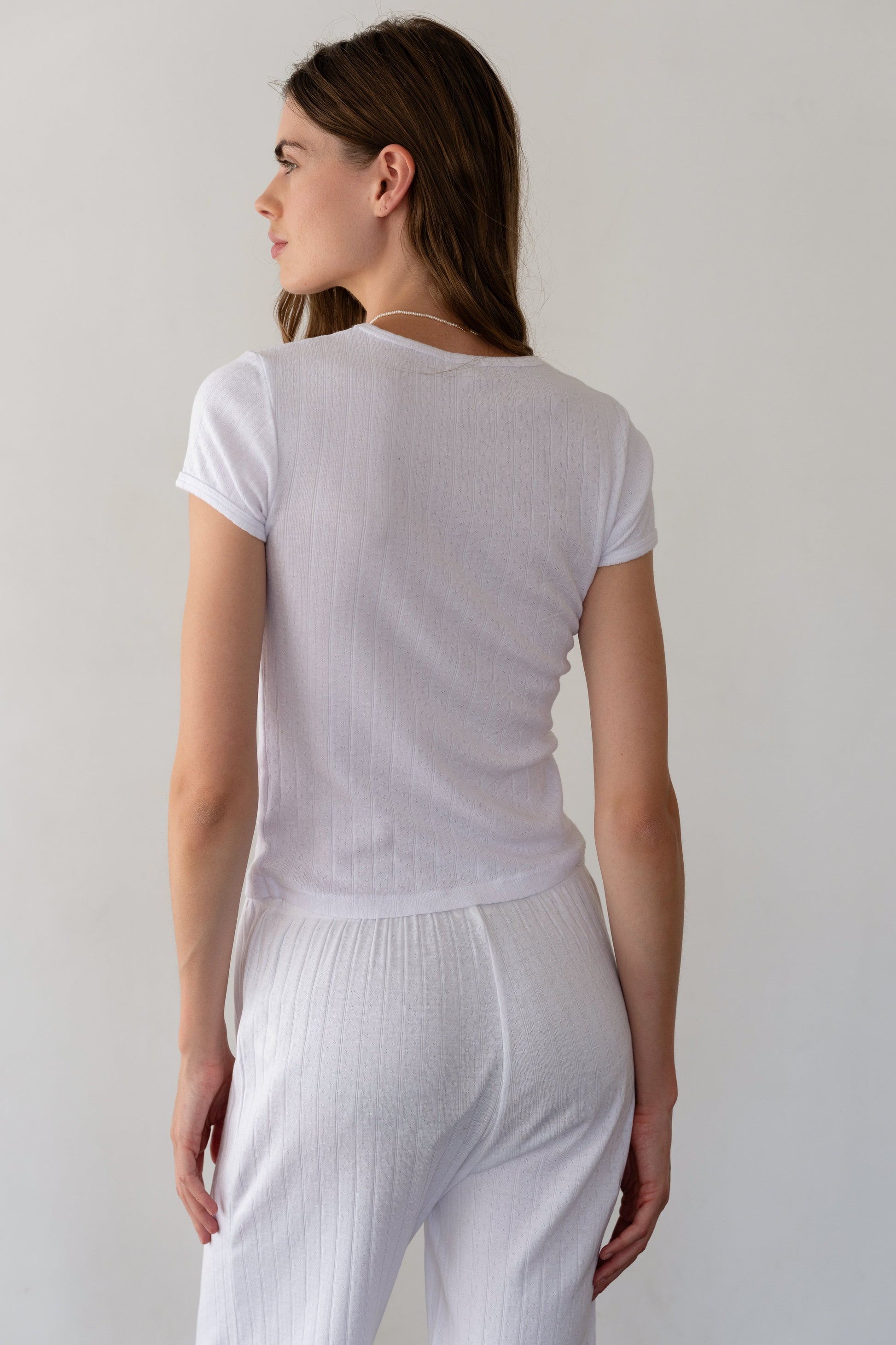 DONNI. THE POINTELLE BABY TEE at Romi Boutique