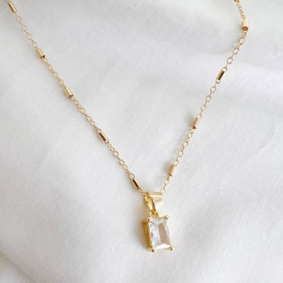 GOLDIE CLEAR CZ PENDANT NECKLACE IN GOLD