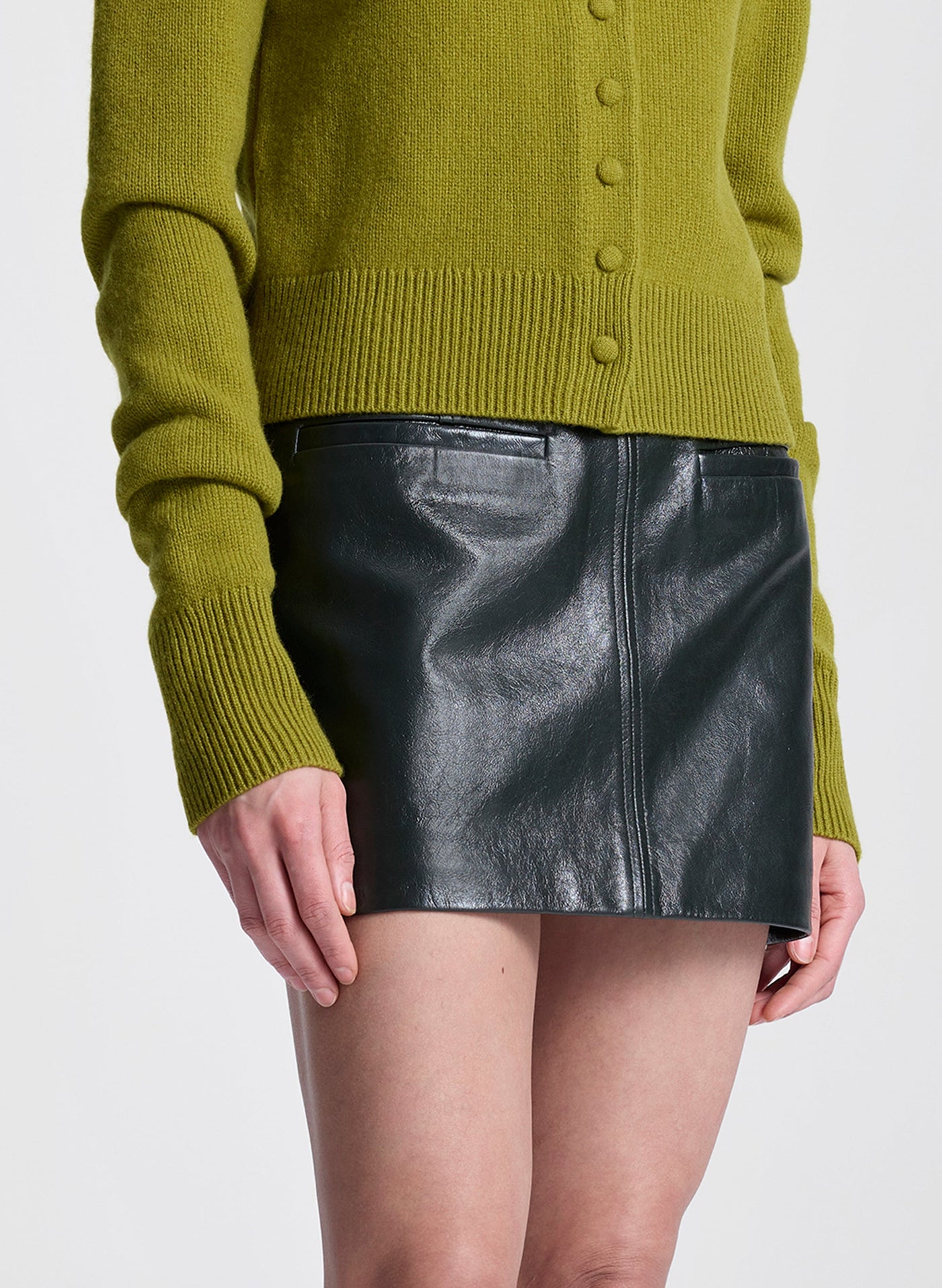 COWAN LEATHER MINI SKIRT IN DARK GREEN