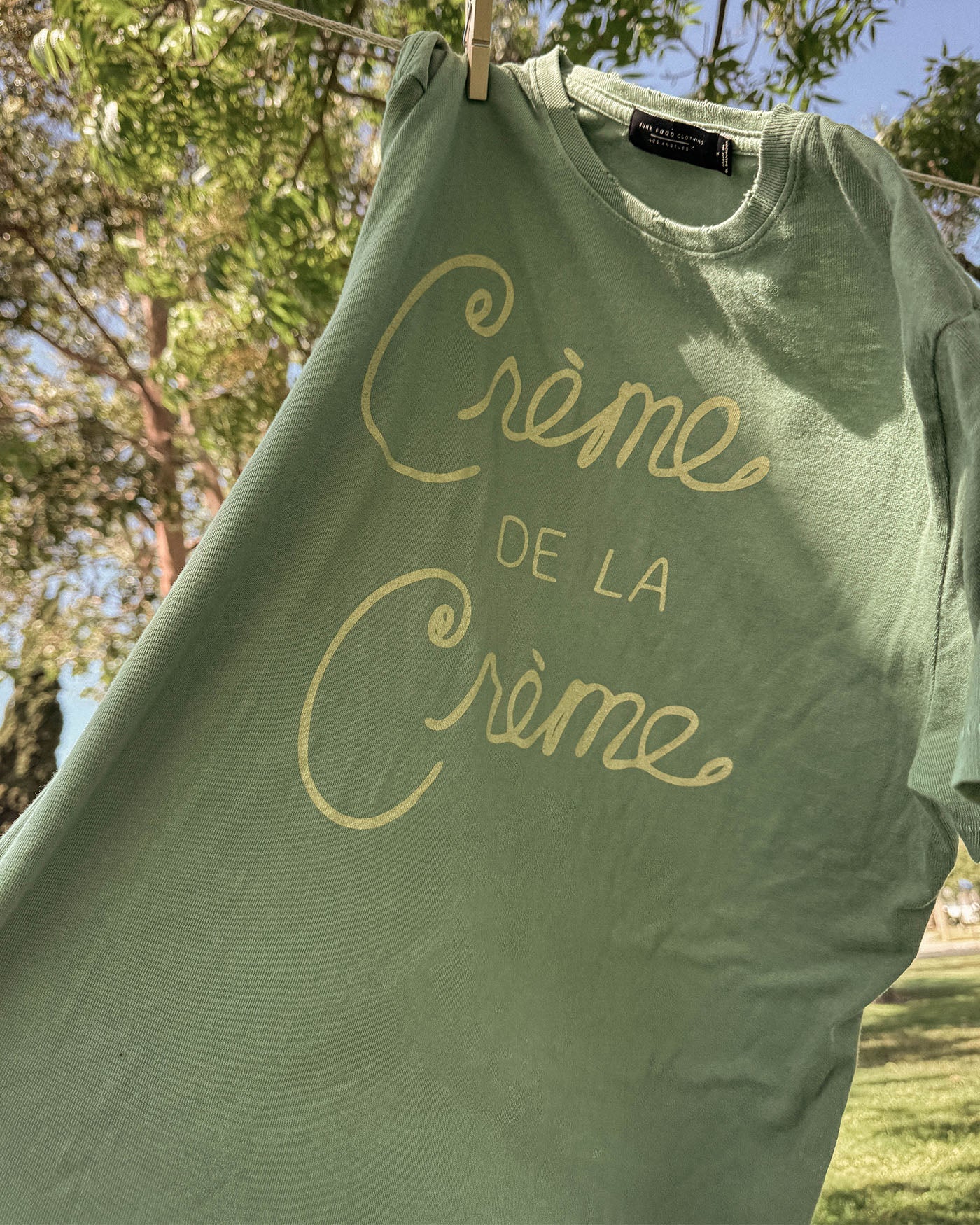 Junk Food CREME DE LA CREME TEE at Romi Boutique