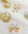 Romi FREEDOM HOOPS IN YELLOW GOLD at Romi Boutique