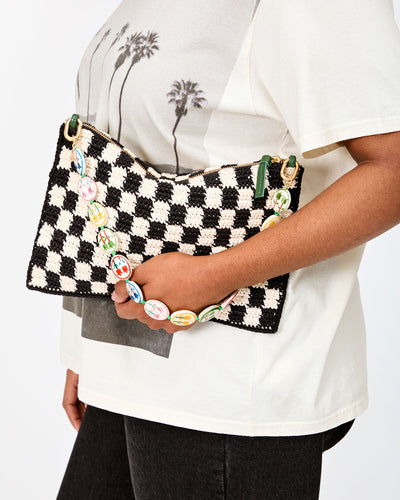 FLAT CLUTCH IN BLACK AND CREAM CROCHET CHECKER - Romi Boutique