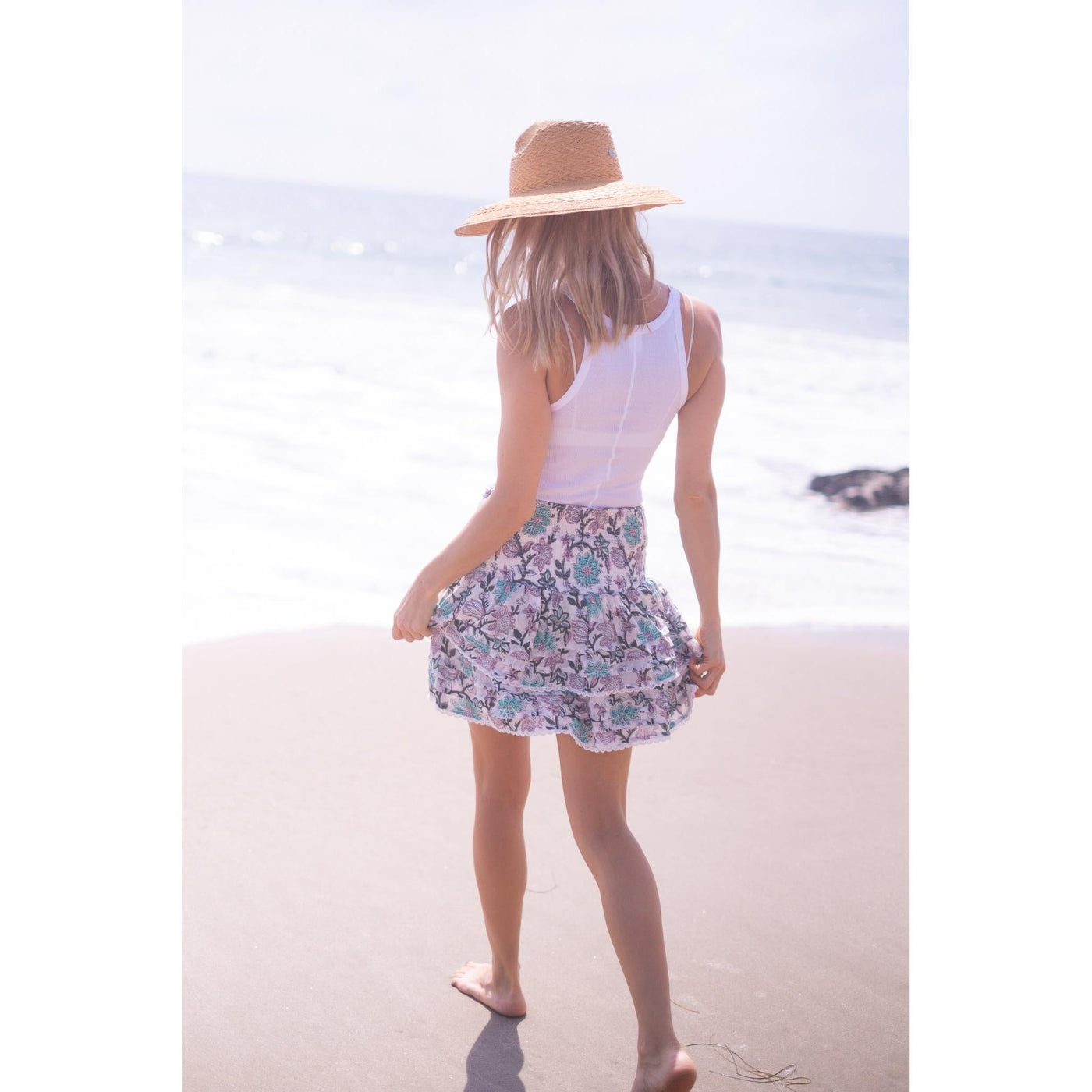 PLEATED SMOCKED MINI SKIRT IN LIGHT TURQUOISE PURPLE FLORAL