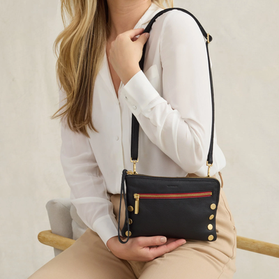 NASH SMALL IN BLACK/BRUSHED GOLD RED ZIP