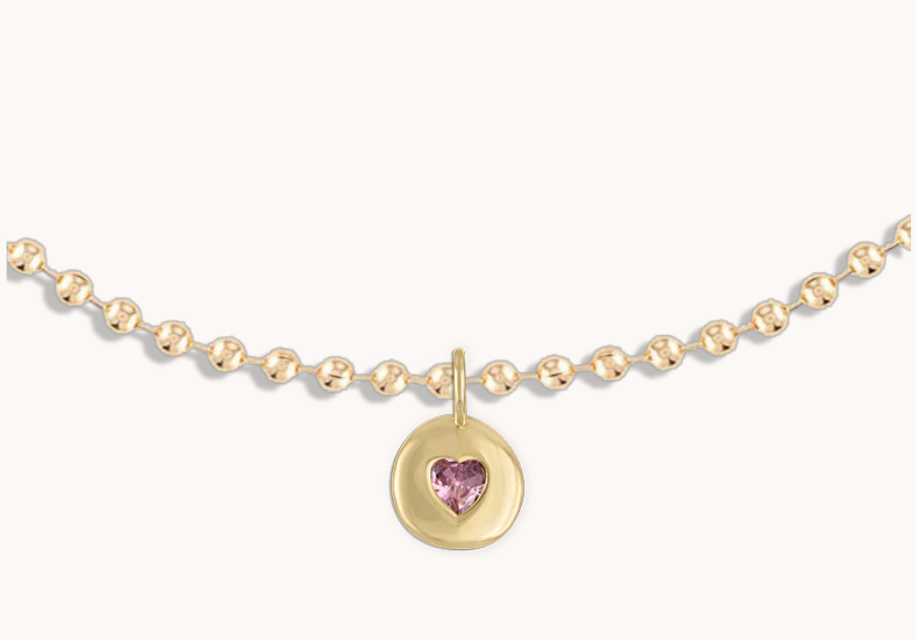 Alexa Leigh PINK HEART CHARM NECKLACE IN GOLD at Romi Boutique