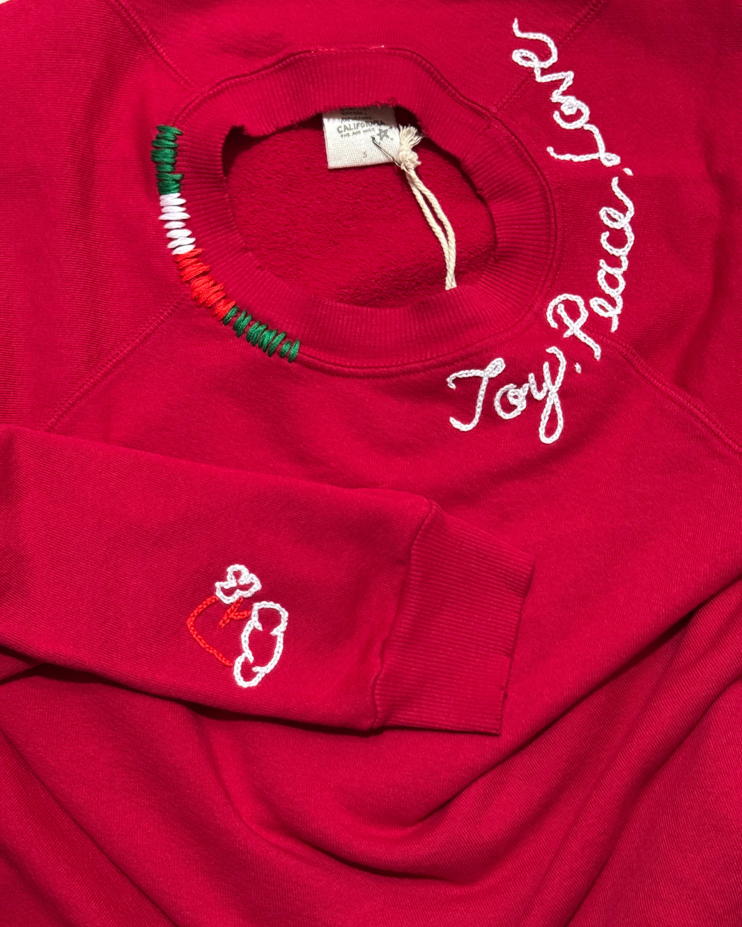 JOY, PEACE, & LOVE SANTA CREW SWEATSHIRT IN RED