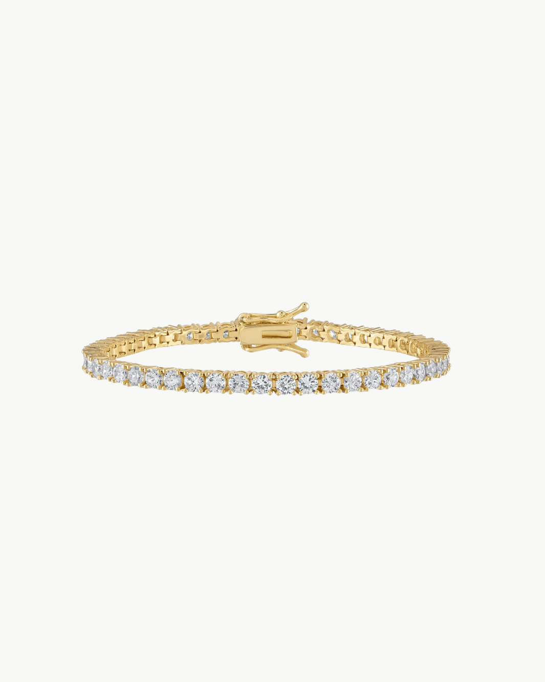 CRYSTAL TENNIS BRACELET IN GOLD - Romi Boutique