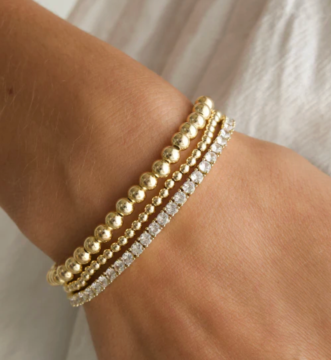 CRYSTAL TENNIS BRACELET IN GOLD by Alexa Leigh - Romi Boutique
