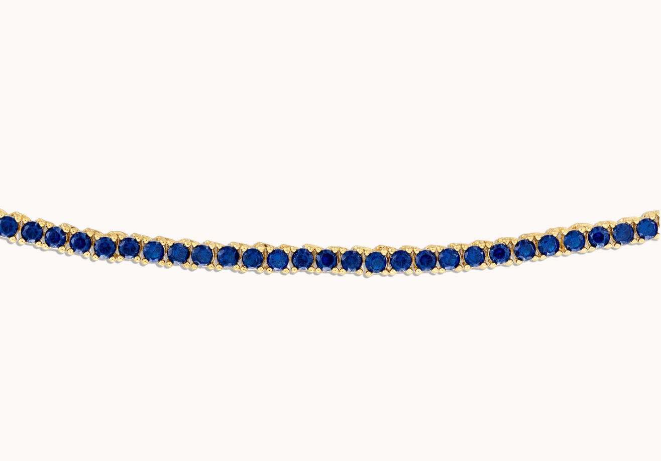 NAVY CRYSTAL TENNIS NECKLACE IN GOLD by Alexa Leigh - Romi Boutique