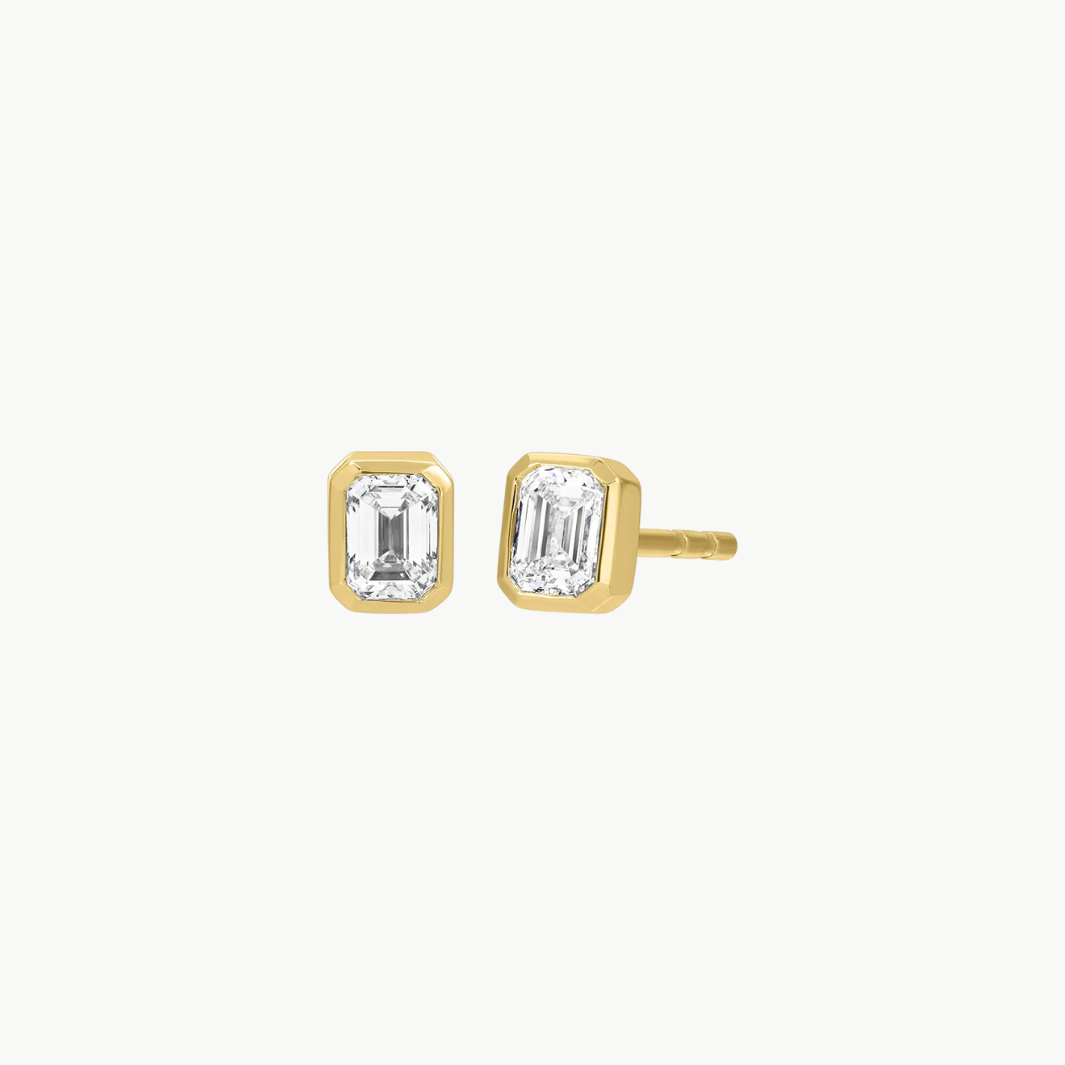 BEZEL SET EMERALD CUT DIAMOND STUD EARRING IN 14K YELLOW GOLD