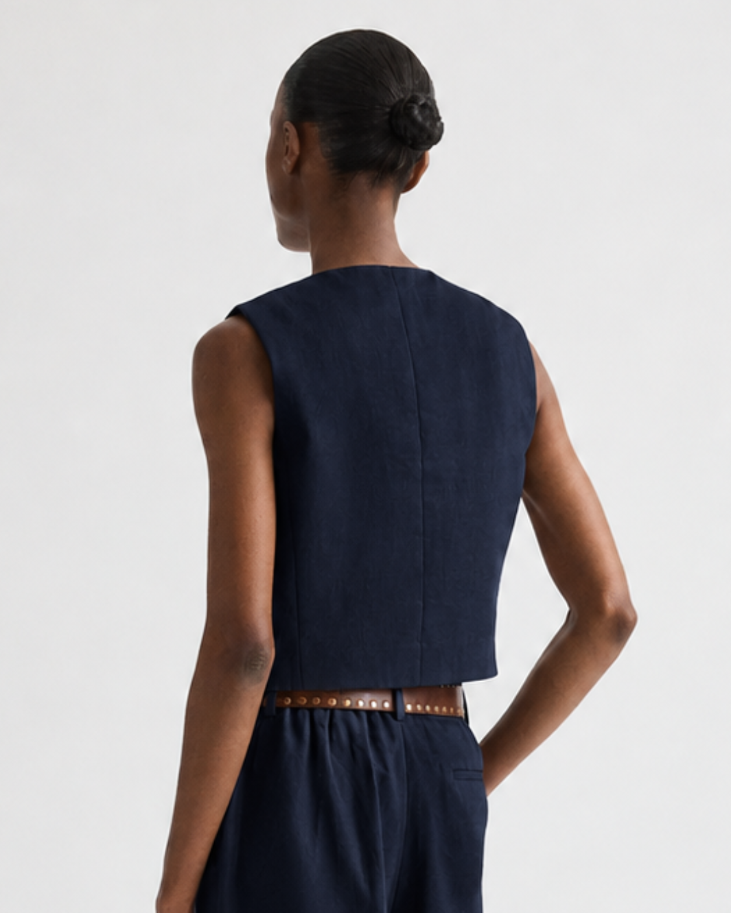 TWP High Neck Hidden Placket Vest at Romi Boutique