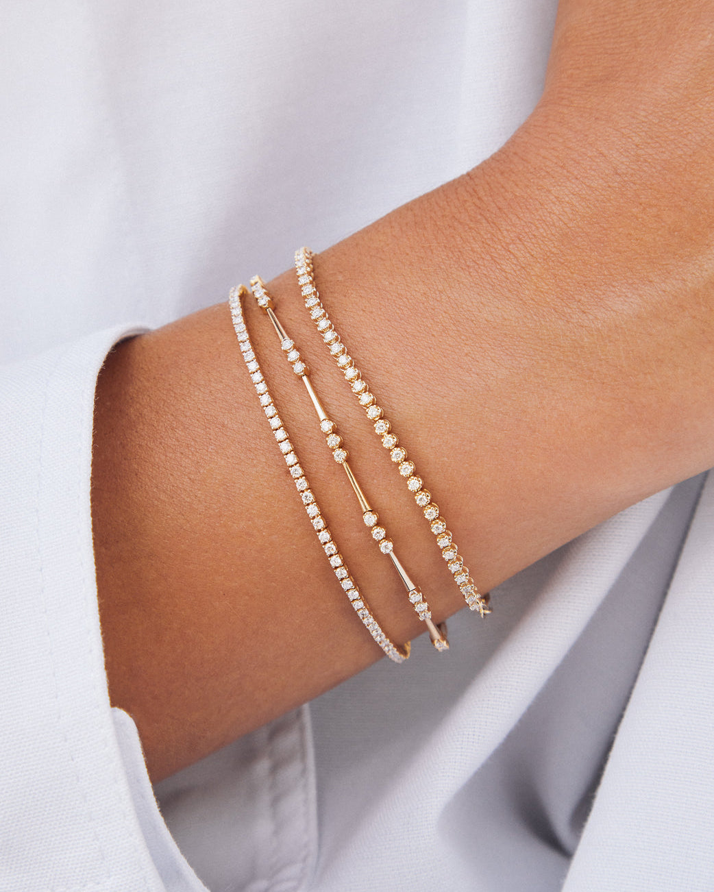 CROWN SET DIAMOND ETERNITY BRACELET IN 14K YELLOW GOLD - Romi Boutique