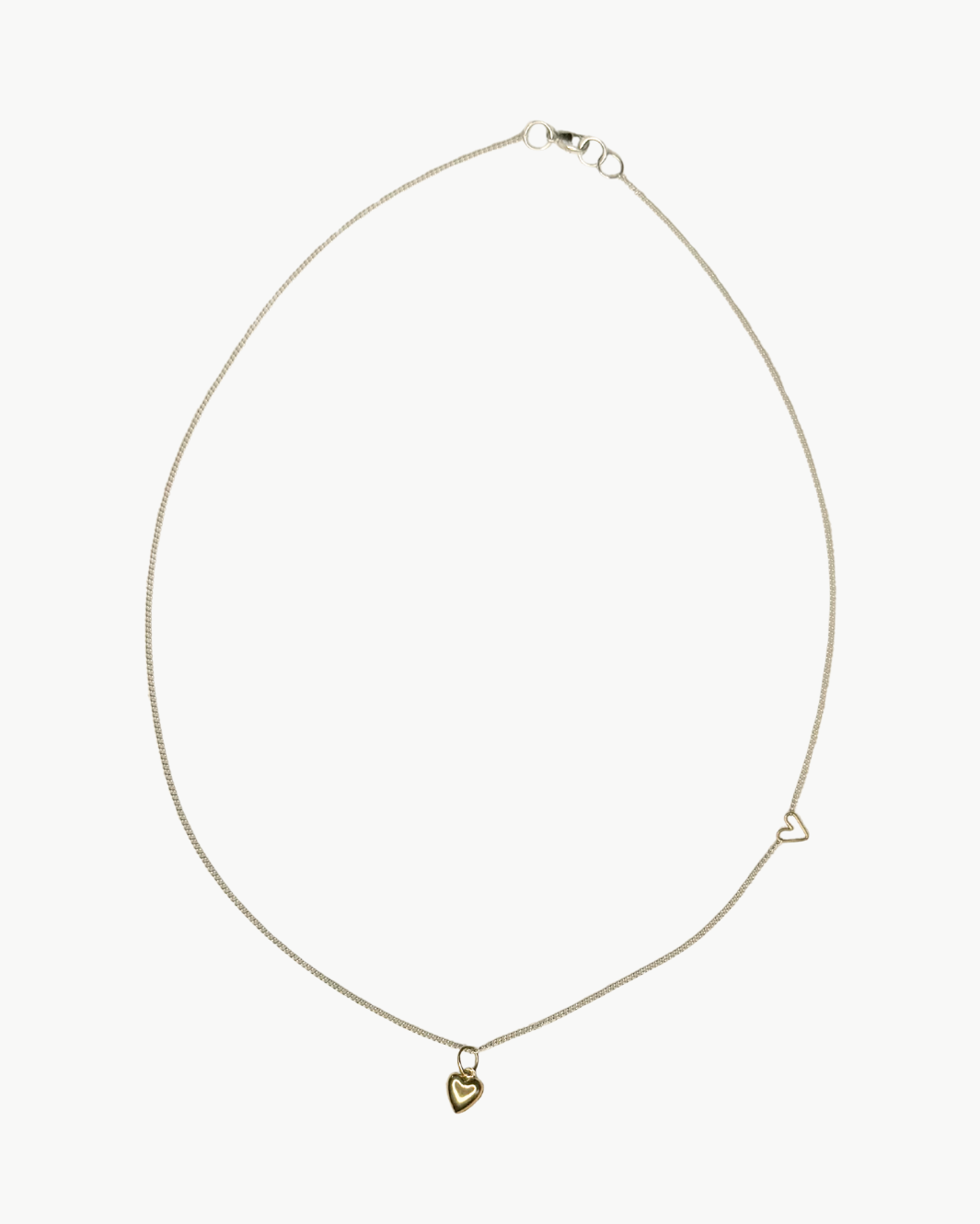 JANE HOLLINGER TINY PUFF HEART NECKLACE IN TWO-TONE at Romi Boutique