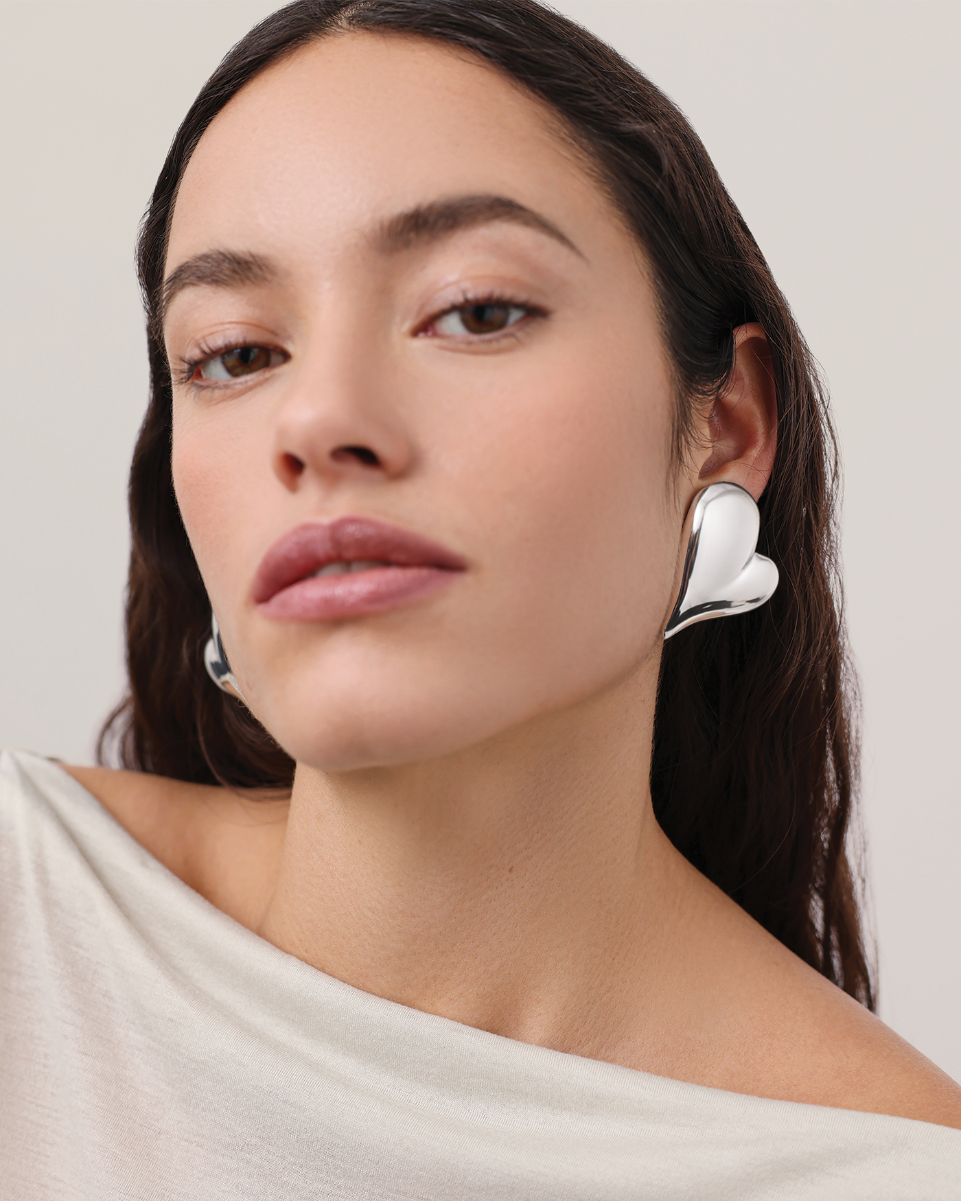 MEGA ART HEART SYMMETRICAL BUTTON EARRINGS IN SILVER - Romi Boutique