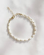 STONE HARBOR BRACELET IN FRESHWATER PEARL/GOLD - Romi Boutique