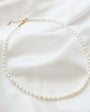 SEA ISLE FRESHWATER RICE PEARL BEADED NECKLACE IN GOLD - Romi Boutique